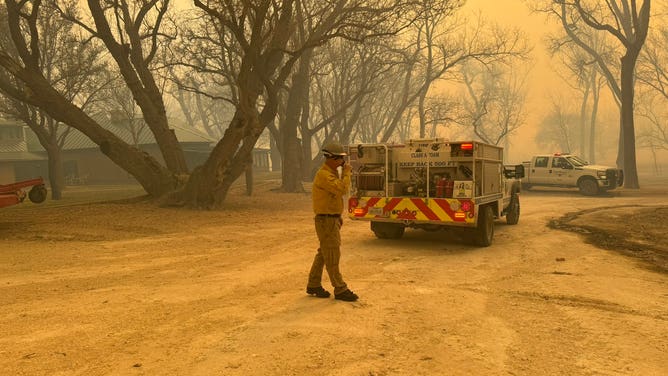 Photos show smoke from the Smokehouse Creek Fire burning in the Texas Panhandle on February 27, 2024.