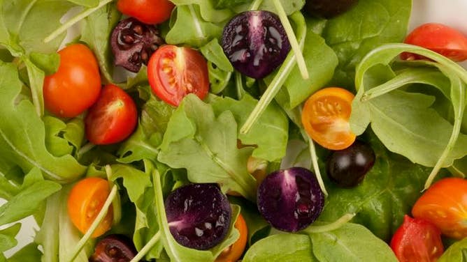 Purple tomatoes in a salad.