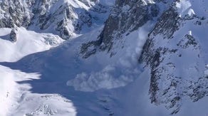 Skiers capture video of avalanche plunging down French Alps
