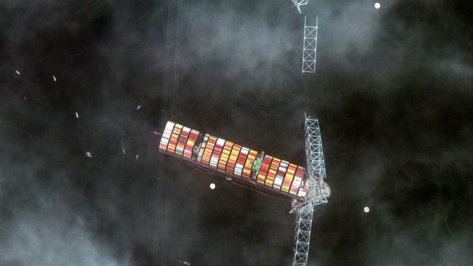 A MAXAR satellite image shows the Dali containership after crashing into the Francis Scott Key Bridge in Baltimore, Maryland on March 26, 2024.