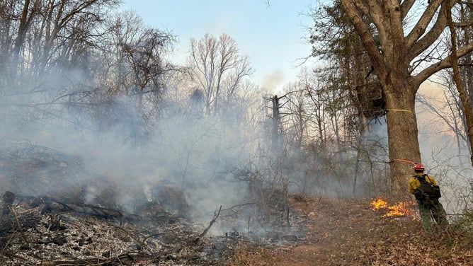 Firefighters battle the Rocky Branch Fire inside Shenandoah National Park in Virginia.