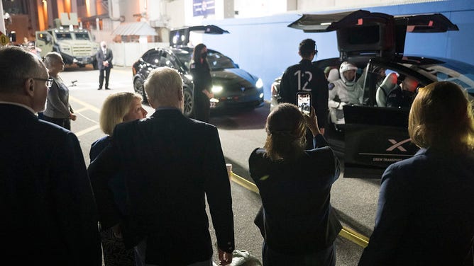 From left to right, NASA associate administrator Jim Free, NASA Deputy Administrator Pam Melroy, NASA Administrator Bill Nelson, Director of NASA’s Johnson Space Center Vanessa Wyche, and NASA deputy associate administrator Casey Swails are seen as NASA astronauts Matthew Dominick, Michael Barratt, and Jeanette Epps, and Roscosmos cosmonaut Alexander Grebenkin, wearing SpaceX spacesuits, wave as they prepare to depart the Neil A. Armstrong Operations and Checkout Building for Launch Complex 39A to board the SpaceX Dragon spacecraft for the Crew-8 mission launch, Sunday, March 3, 2024, at NASA’s Kennedy Space Center in Florida.
