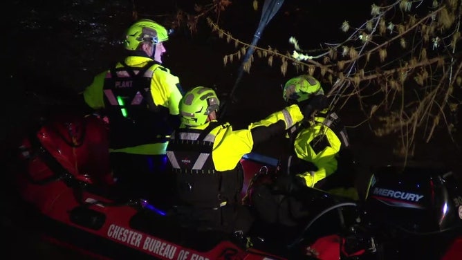 A team searches Chester Creek in Chester, Pennsylvania, on March 23, 2024.