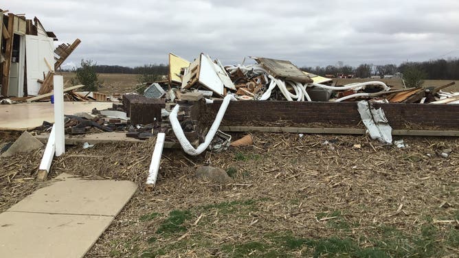 Family residence where outer walls collapsed in Indiana.