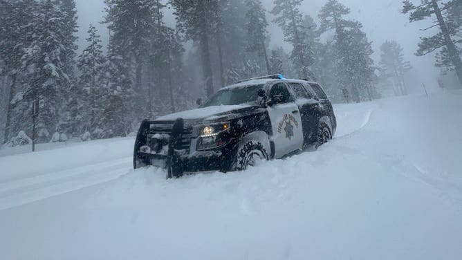 A CHP-South Lake Tahoe SUV in the snow.