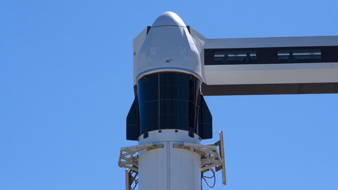 A SpaceX Falcon 9 and Cargo Dragon spacecraft at Launch Complex 40 in Cape Canaveral, Florida ahead of the CRS-30 launch.