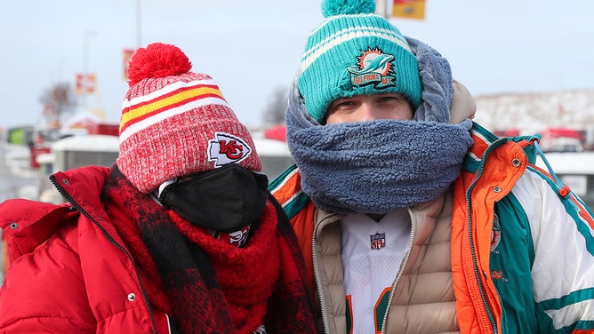 Kansas City Chiefs and Miami Dolphins fans are bundled up to brave the brutal cold before an AFC Wild Card playoff game between the Miami Dolphins and Kansas City Chiefs on Jan 13, 2024 at GEHA Field at Arrowhead Stadium in Kansas City, Missouri.