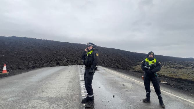 Emergency services are seen near to the site of the volcanic eruption on March 17, 2024 in Grindavik, Iceland. The Icelandic Meteorological Office confirmed a volcanic eruption started between Stora Skogfell and Hagafell on Saturday evening, the fourth time since December. 