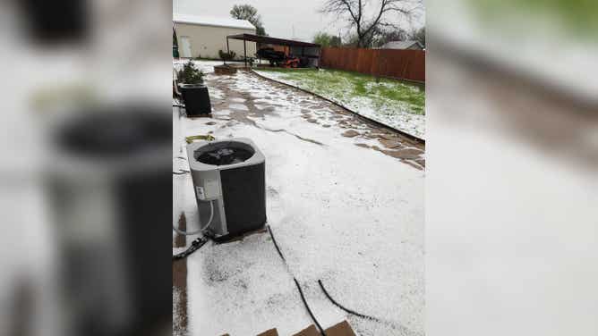 Hail covers ground in North Texas. Photo taken outside of Graford.