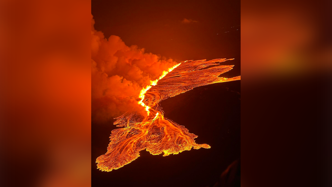 This image shows lava flowing from a volcano in Iceland after it erupted for the fourth time in three months on Saturday, March 16, 2024.