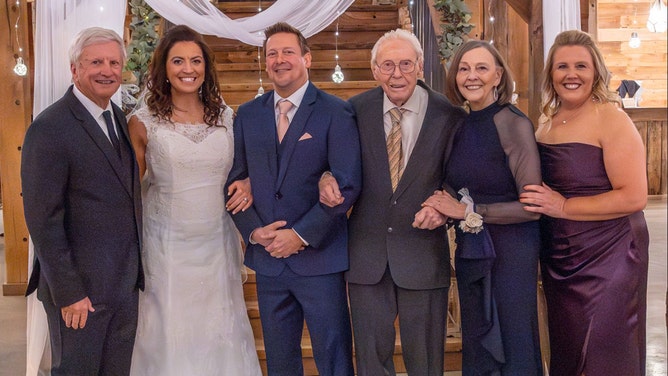 Laverne Biser was accompanied by his family members at his granddaughter's wedding in December 2023.