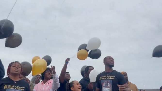 Friends and family release balloons in memory of Brenda Odems, one of the 21 victims killed in a tornado on March 24, 2023.