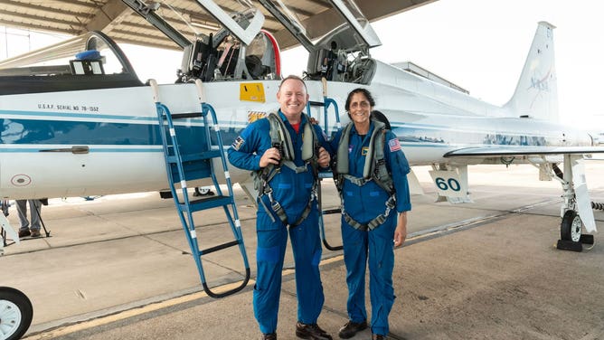NASA astronauts Suni Williams (right) and Barry 