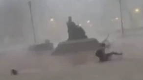 Video shows Kentucky student knocked off feet by severe storm's wind