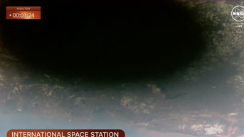 Astronauts get eerie view of Moon’s shadow as it trudges across Earth during eclipse