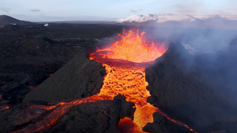 Drone video shows lava bubbling from volcano crater