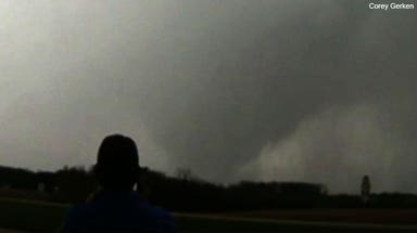 Tornado injures 2 in Kansas as more dangerous storms tear across Midwest