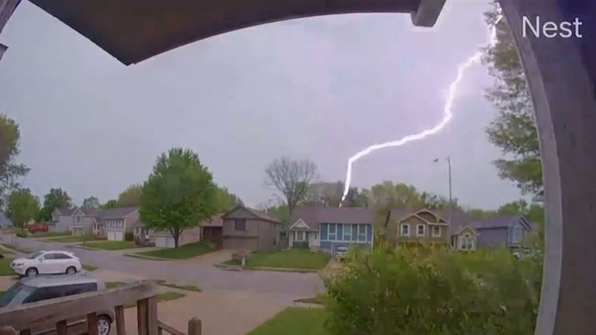 Jordan Frederick captured a bolt of lightning striking a nearby house on his doorbell camera. Soon after, a loud roll of thunder was heard.