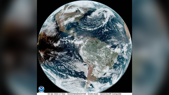 This image shows the Moon's shadow starting to appear in the Pacific Ocean in advance of a total solar eclipse on Monday, April 8, 2024.