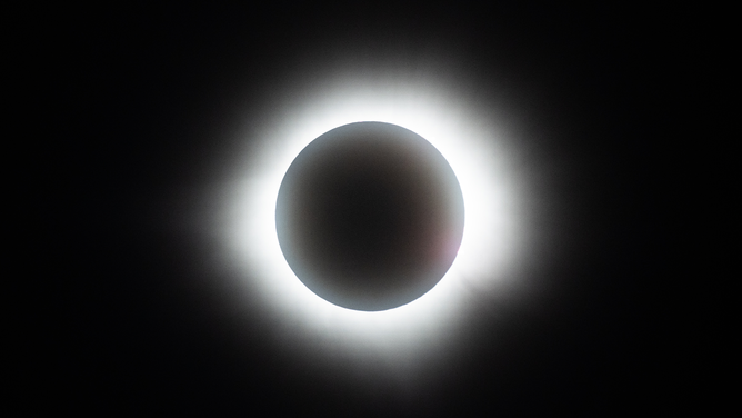 MAZATLAN, MEXICO - APRIL 08: The sun disappears behind the moon during the Great North American Eclipse on April 08, 2024 in Mazatlan, Mexico. Millions of people have flocked to areas across North America that are in the "path of totality" in order to experience a total solar eclipse. During the event, the moon will pass in between the sun and the Earth, appearing to block the sun. (Photo by Hector Vivas/Getty Images)