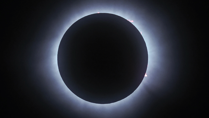 MAZATLAN, MEXICO - APRIL 08: The sun disappears behind the moon during the Great North American Eclipse on April 08, 2024 in Mazatlan, Mexico. Millions of people have flocked to areas across North America that are in the "path of totality" in order to experience a total solar eclipse. During the event, the moon will pass in between the sun and the Earth, appearing to block the sun. (Photo by Hector Vivas/Getty Images)