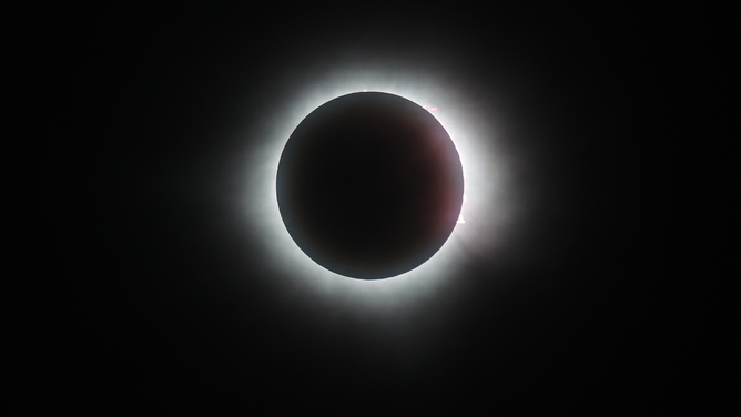 MAZATLAN, MEXICO - APRIL 08: The sun disappears behind the moon during the Great North American Eclipse on April 08, 2024 in Mazatlan, Mexico. Millions of people have flocked to areas across North America that are in the "path of totality" in order to experience a total solar eclipse. During the event, the moon will pass in between the sun and the Earth, appearing to block the sun. (Photo by Hector Vivas/Getty Images)