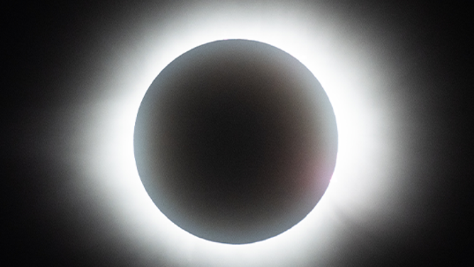 MAZATLAN, MEXICO - APRIL 08: The sun disappears behind the moon during the Great North American Eclipse on April 08, 2024 in Mazatlan, Mexico. Millions of people have flocked to areas across North America that are in the "path of totality" in order to experience a total solar eclipse. During the event, the moon will pass in between the sun and the Earth, appearing to block the sun. (Photo by Hector Vivas/Getty Images)