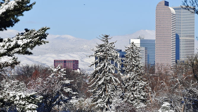 Photo taken snow covered City Park and front range at the park in Denver, Colorado on Tuesday, April 20, 2021.