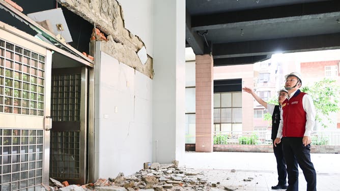 TAOYUAN, TAIWAN - APRIL 3: Taoyuan City Deputy Mayor Su Junbin inspects the Sanyuanjidi Community Building and Dazhi Citizen Activity Center in Bade District as at least four people were killed and hundreds of others injured after a magnitude 7.4 earthquake struck off Taiwan's eastern coast on the Richter scale, in Taoyuan, Taiwan on April 3, 2024. He stated that initially there was no problem with the main structure, but due to the construction of the property is more complex, the decision will be made in conjunction with the Building Management Office and the Civil and Structural Technicians Association. (Photo by Taoyuan City Government/Anadolu via Getty Images)