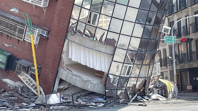 HUALIEN, TAIWAN - APRIL 3: The Uranus Building at Xuanyuan Road is tilted severely as at least four people were killed and hundreds of others injured after a magnitude 7.4 earthquake struck off Taiwan's eastern coast on the Richter scale, in Hualien, Taiwan on April 3, 2024. The building tilted at an angle of more than 60 degrees, and one person is still missing. The police immediately went to the rescue after receiving the report. (Photo by Hualien County Fire Department/Anadolu via Getty Images)