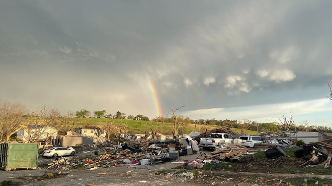 A rainbow appeared on Tuesday morning in Elkhorn, Nebraska, amidst the devastation from an EF-3 tornado on Friday afternoon, reminding residents of nature's resilience.