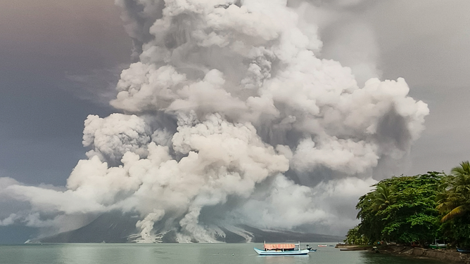 An eruption from Mount Ruang volcano is seen from Tagulandang island in Sitaro, North Sulawesi, on April 30, 2024. (Photo by AFP) (Photo by STR/AFP via Getty Images)