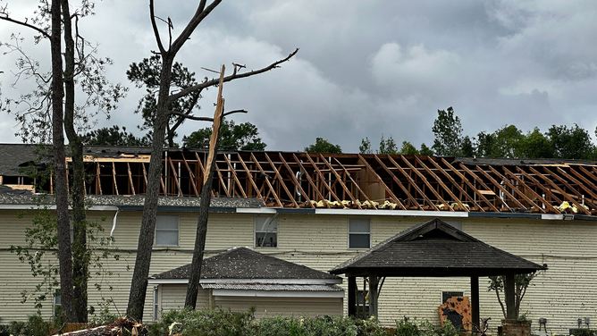 The roof of a building was ripped away after a tornado in Slidell, Louisiana, on Wednesday, April 10, 2024.