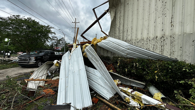 Parts of a building are seen on the ground after a tornado in Slidell, Louisiana, on Wednesday, April 10, 2024.