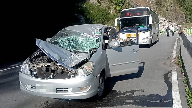 A small passenger vehicle is seriously damaged and the windshield is shattered after hit by falling rocks on the Zhonghengbian Road as at least four people were killed and hundreds of others injured after a magnitude 7.4 earthquake struck off Taiwan's eastern coast on the Richter scale, in Taichung, Taiwan on April 3, 2024. (Photo by Guguan Public Works Section/Anadolu via Getty Images)