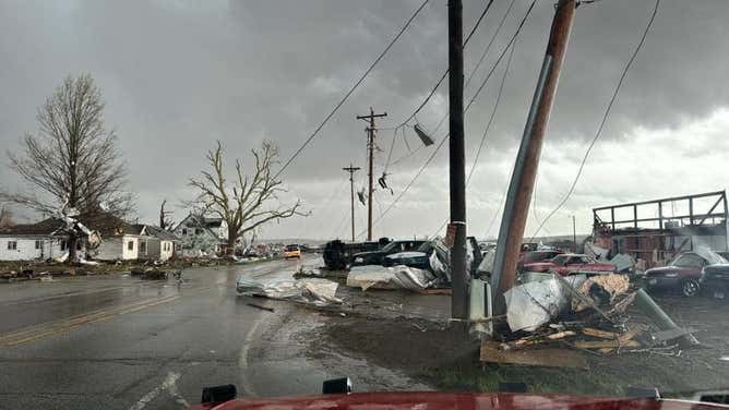 Storm chasers captured video of a large twister producing damage in the towns of Shelby and Minden in Iowa.