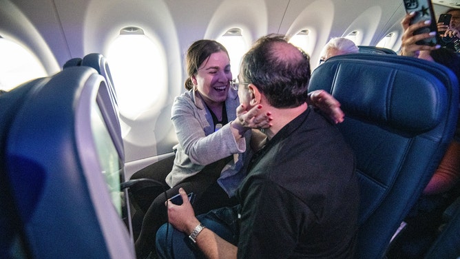 While many customers were glued to their windows, customer Neil Albstein proposed to his girlfriend Michele Rosenblatt. After two months of planning for the memorable moment, the stars aligned perfectly.