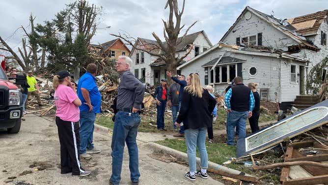 Governor of Iowa tours Minden tornado damage.