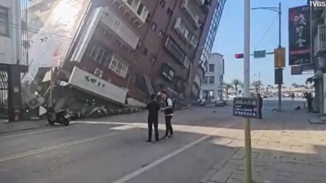 A strong earthquake rocked Taiwan on Wednesday, destroying buildings and triggering a tsunami threat