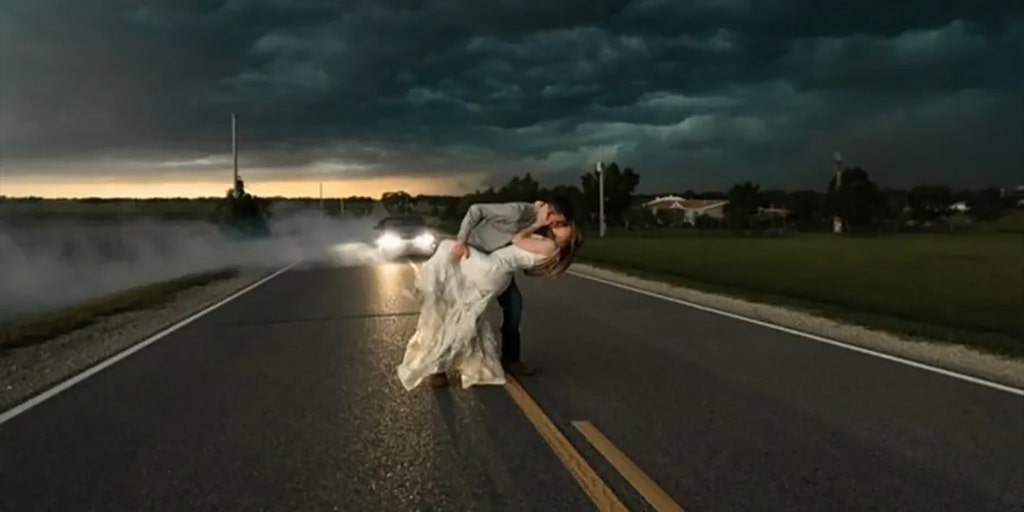 Newlyweds pose for epic wedding photos as thunderstorm looms Fox Weather(02)