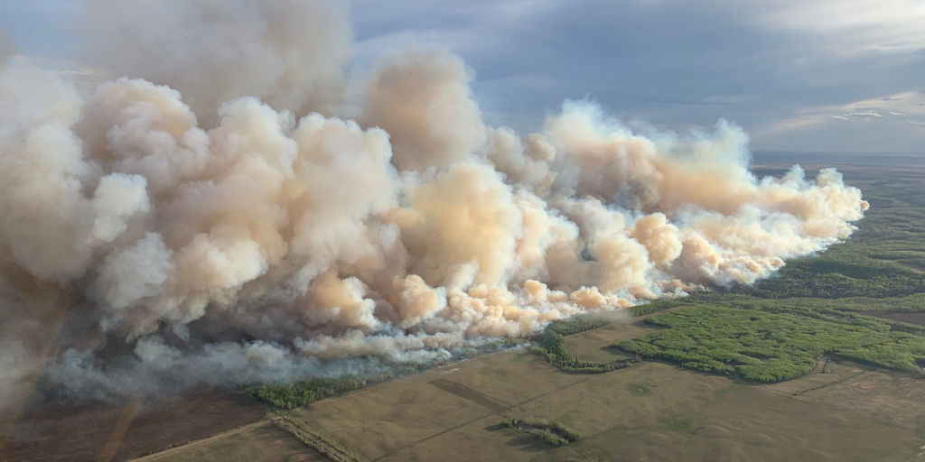 Thousands Evacuated as Wildfires Rage in Northeastern British Columbia and Alberta