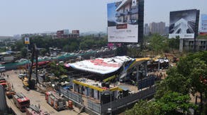 At least 14 killed in India when thunderstorm winds topple massive billboard