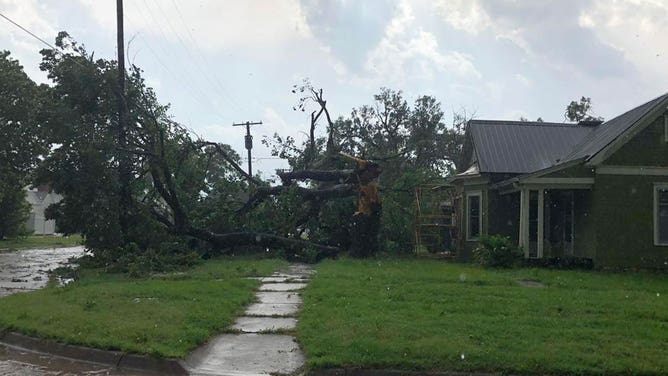 Damage is seen in Russell, Kansas, after a severe storm ripped through the town May 19, 2024.