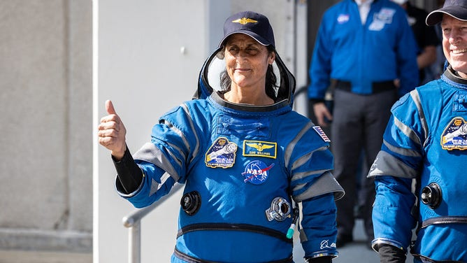 NASA’s Boeing Crew Flight Test astronaut Suni Williams flashes a thumbs up after exiting the Neil A. Armstrong Operations and Checkout Building at the agency’s Kennedy Space Center in Florida during a mission dress rehearsal on Friday, April 26, 2024. As part of the agency’s Commercial Crew Program, Wilmore and Williams are the first to launch to the International Space Station aboard Boeing’s Starliner spacecraft. Liftoff atop a United Launch Alliance Atlas V rocket from Space Launch Complex-41 at nearby Cape Canaveral Space Force Station is scheduled for 10:34 p.m. ET Monday, May 6. 