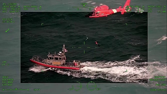 This images shows the U.S. Coast Guard rescuing a boater who was among four that were stranded on a life raft off the coast of Texas on Monday, May 13, 2024.