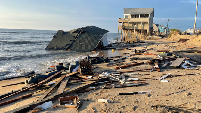 This photo shows a home that collapsed into the Atlantic Ocean along the Cape Hatteras National Seashore in North Carolina on Tuesday, May 28, 2024.