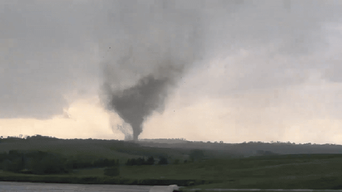 Images show a tornado in Corning, Iowa on May 21, 2024 during a severe weather outbreak