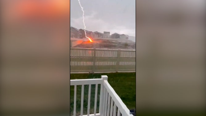 A woman in Saratoga Springs, Utah, couldn’t believe her eyes when she captured video of a sudden strong burst of lightning outside of her home on Saturday, May 25.