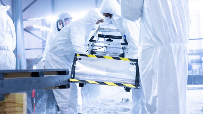 Teams compete with their lunar rovers during the qualifying round of NASA's Lunarbotics competition at University of Central Florida in Orlando on May 15, 2024.