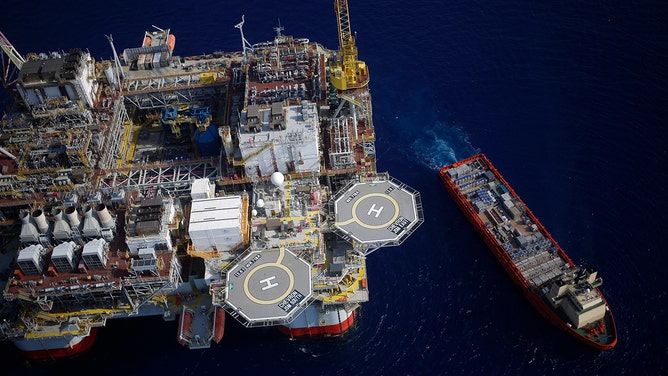 FILE: The Kobe Chouest platform supply vessel sits anchored next to the Chevron Corp. Jack/St. Malo deepwater oil platform in the Gulf of Mexico in the aerial photograph taken off the coast of Louisiana, U.S., on Friday, May 18, 2018.